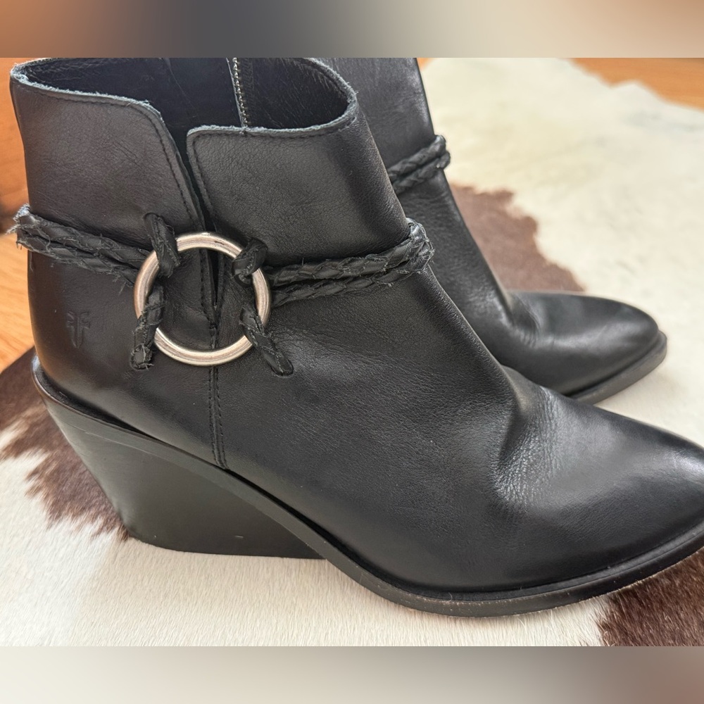 Stylish black frye boots.